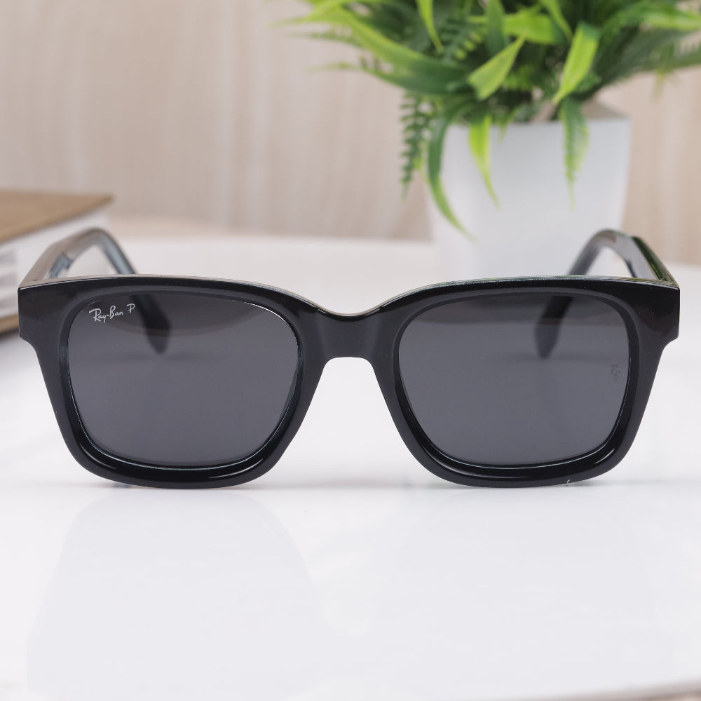 Classic Square 7701 Full Black Polarised Sunglass with matte black frame and polarised lenses featuring UV 400 protection from JUO INDIA.
